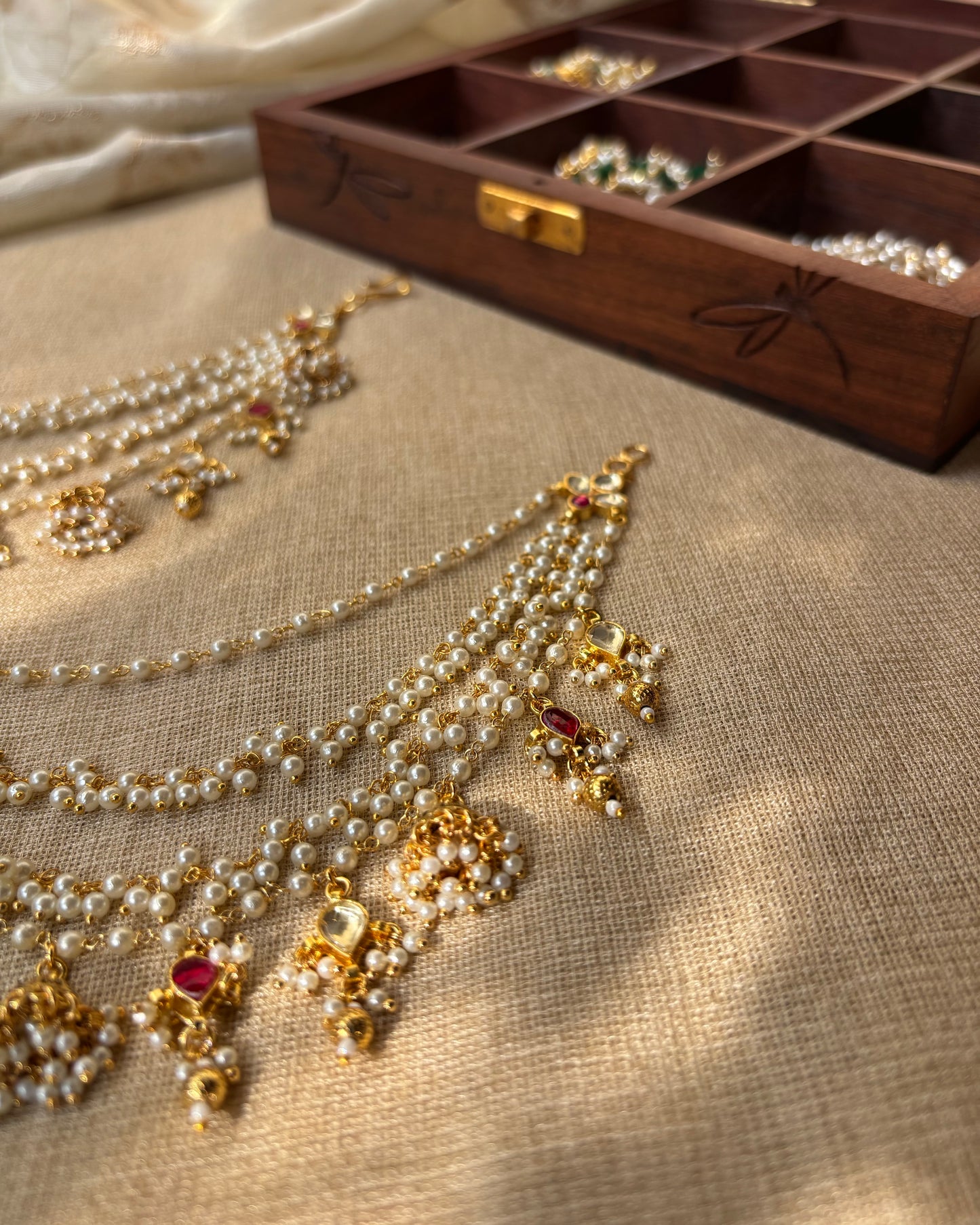 Jadau Kundan Four-Layer Pearl Ear Chain – Ruby & White | EC084