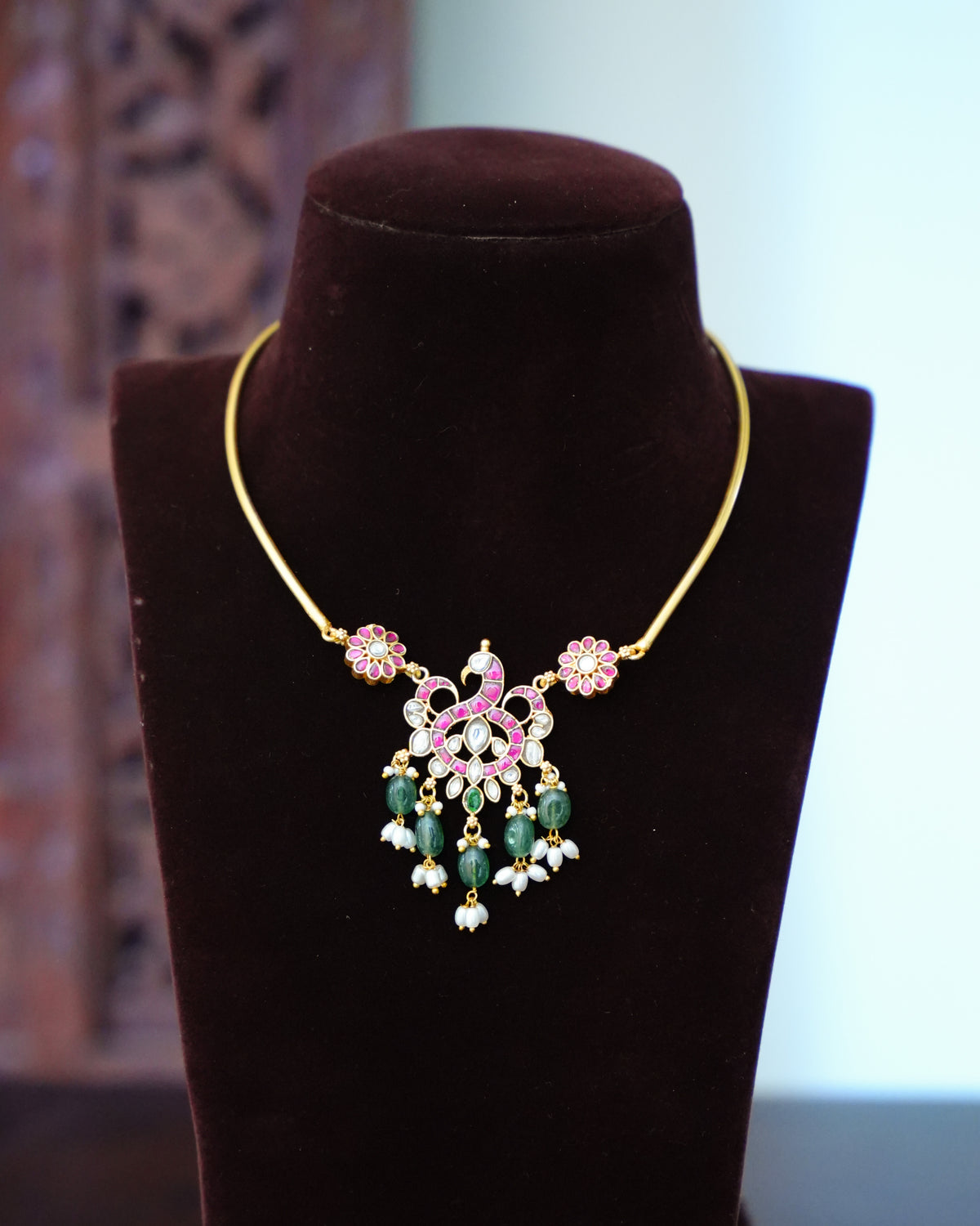 Ruby & White Kundan Peacock Pendant Necklace with Green Bead & Pearl Drops